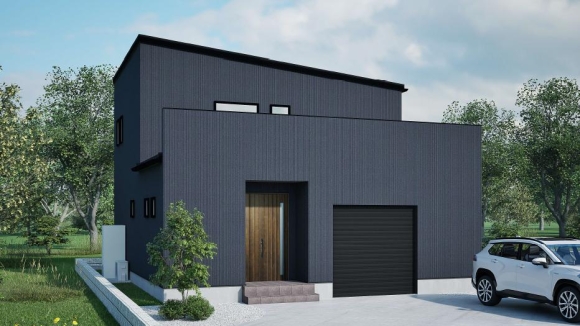 ネイビーの無骨な外壁が、まるで秘密基地のような存在感を放つガレージハウス。ガレージから家に入れますので、雨の日も安心。